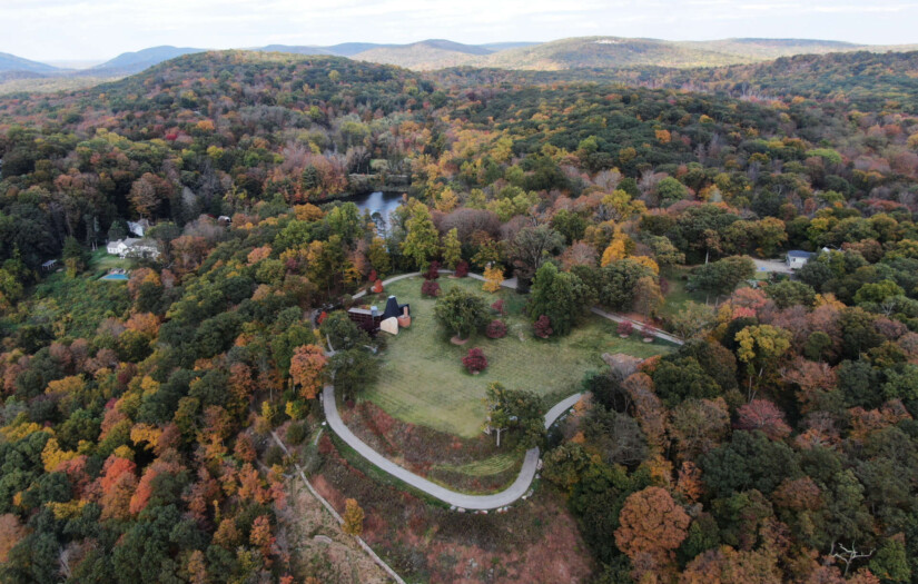 Aerial photo of a house an surrounding landscape